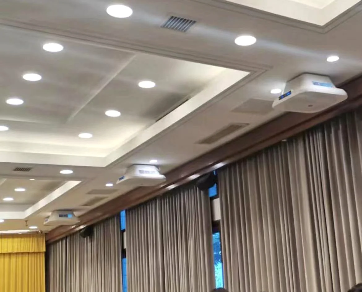 Ceiling air-disinfection units in a professional meeting room