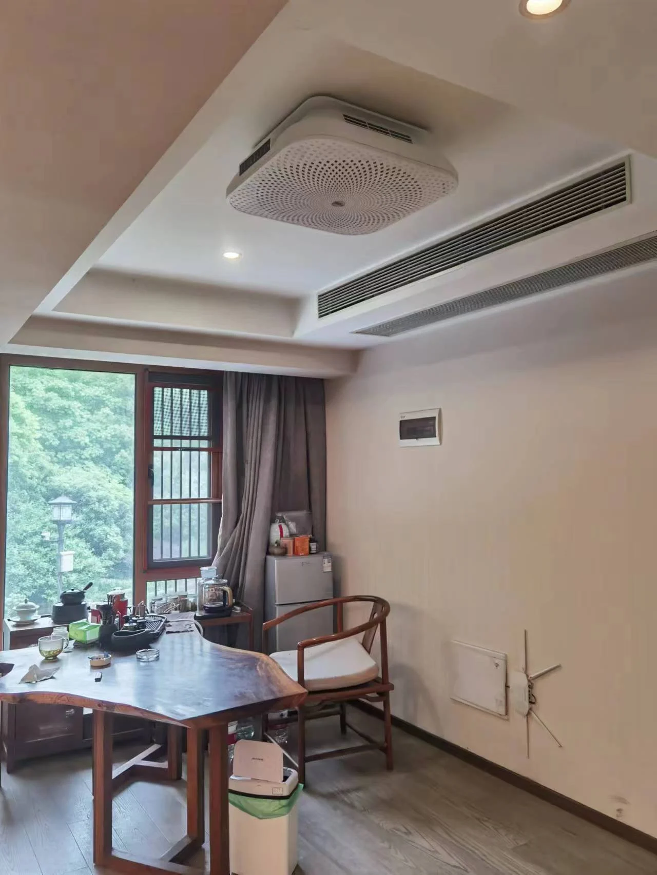 Air-disinfection unit installed in an office lounge area