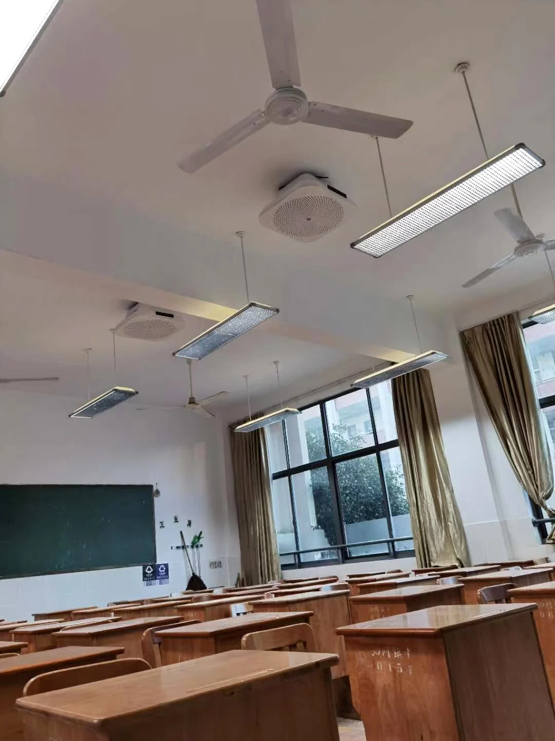 Air-disinfection units installed in an empty school classroom
